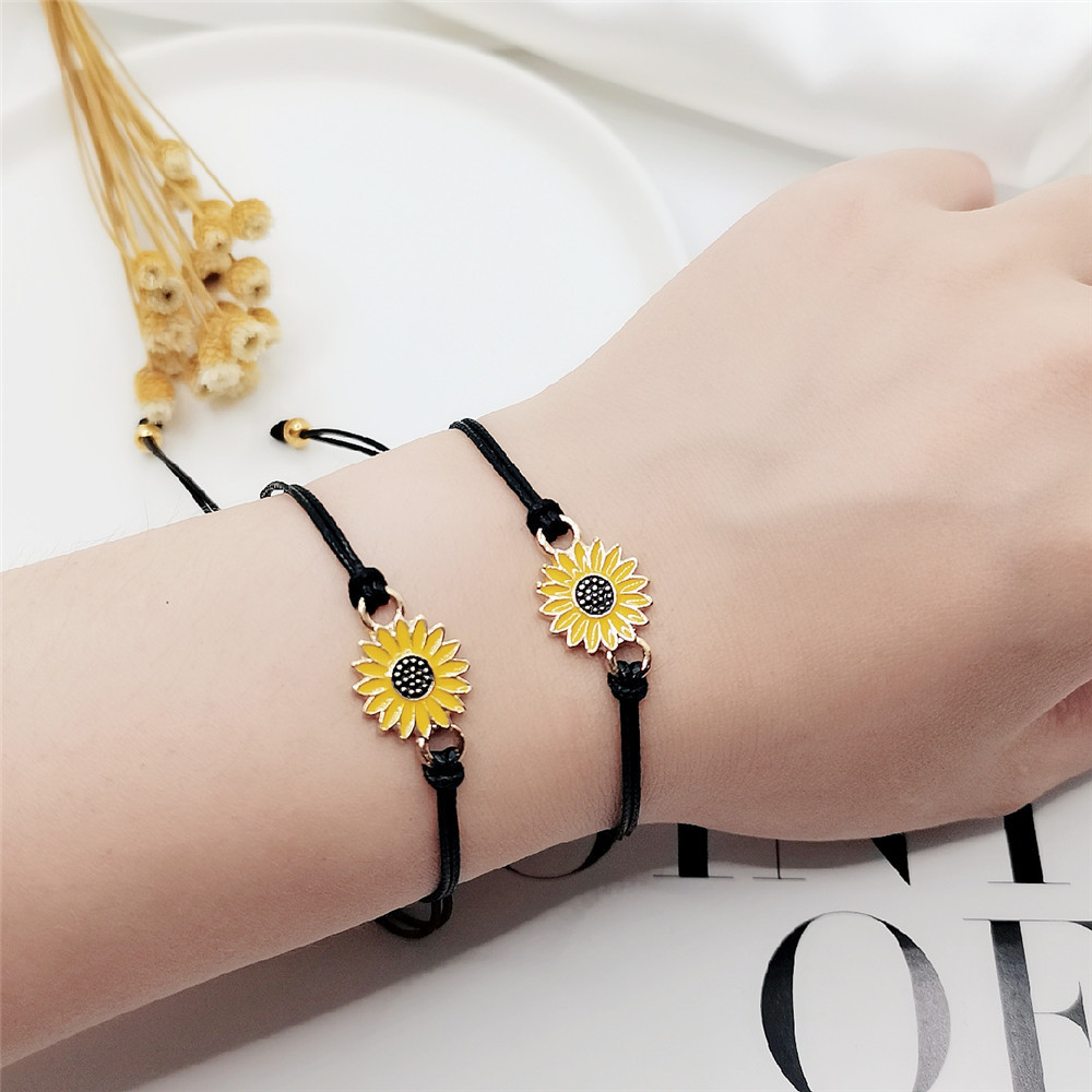 Girasol girasol Margarita pulsera transfronteriza Amazon Venta caliente europea y americana cera hilo tejido amistad aleación pulsera