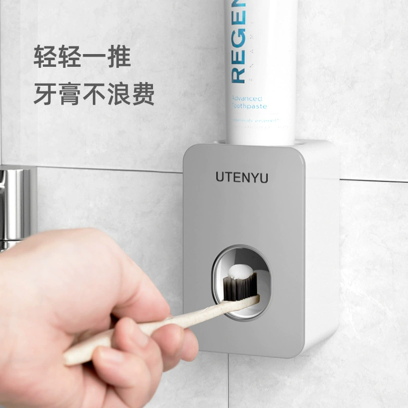 Foreign trade thermal selling free punching automatic squeeze toothpaste sanitary wares collection toothpaste artifact factory direct selling can be fixed