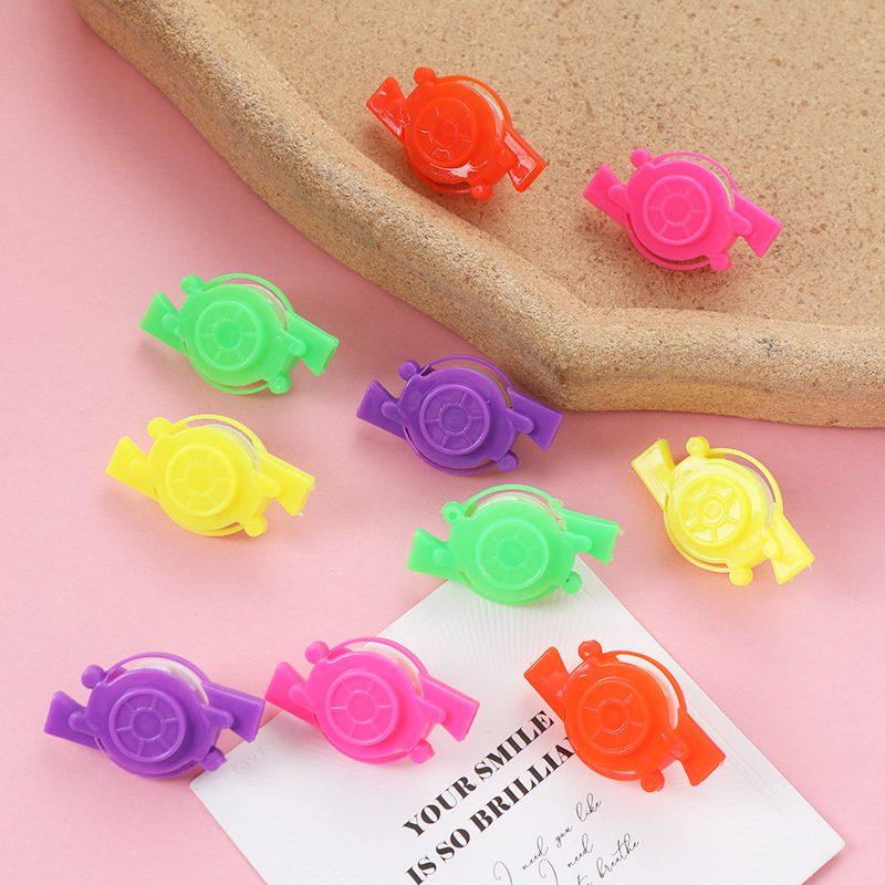 Tamaño pequeño mini boca soplando Gyro juguete niños y niñas boca soplando Gyro nostálgico novela transfronteriza pequeño regalo