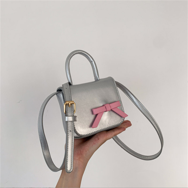 2025 primavera y verano estilo caliente moda casual niños dulces bolsa de gelatina mini bolso de mensajero de un solo hombro variedad al por mayor