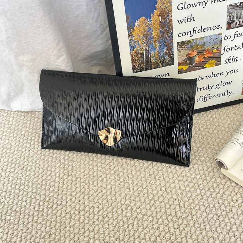 Casual simple estilo exterior de moda sobre de mano bolsas de mujer verano 2026 nuevo nicho coreano diseño textura de viaje