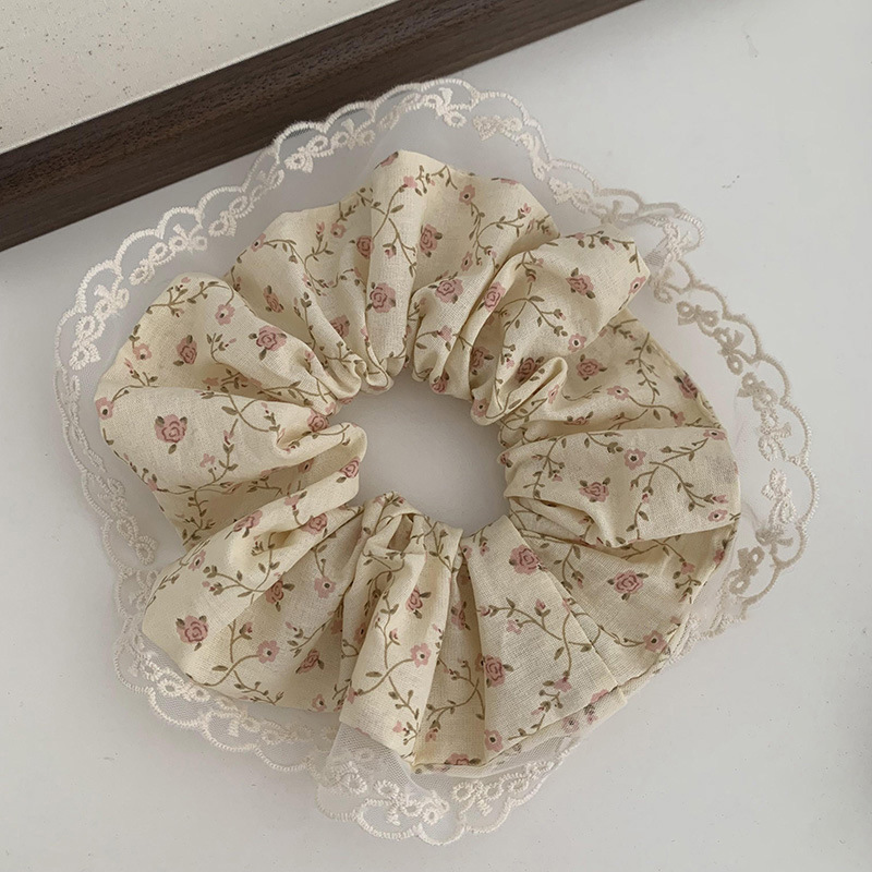 Chouchou en dentelle à motifs floraux pour coiffures élégantes_voghion.com