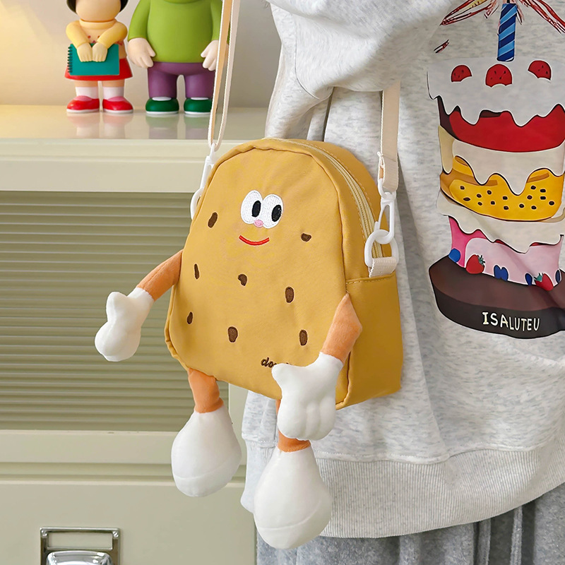 Bolsos de hombro de dibujos animados japoneses para niños y niñas lindos y interesantes pequeñas galletas bebés mochila 2025 nuevo tipo de bolsos para niños