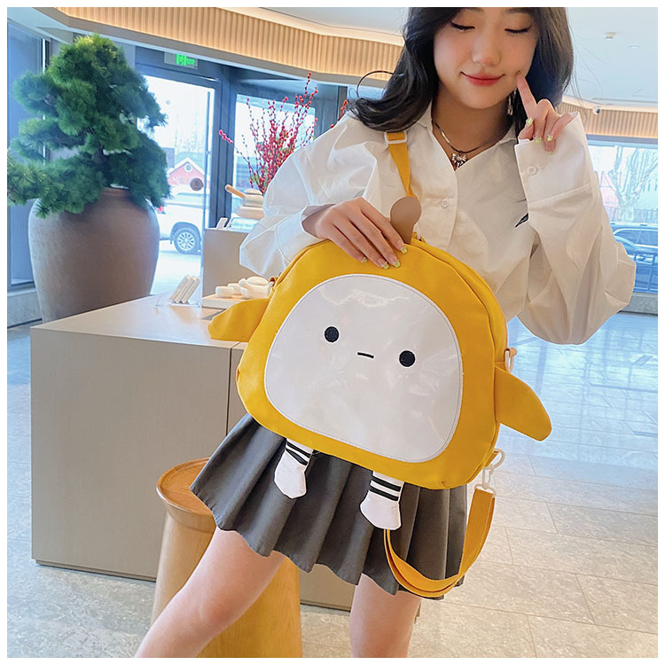 The new 2024 children's egg-shaped party backpack is a cute cartoon canvas single-shoulder bag and a fashionable and stylish small backpack undefined