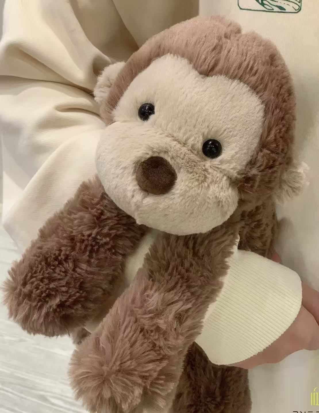 元のイギリスジェリーcatシリーズのぬいぐるみの超全合集3b斉防塵袋のバーゼル熊の手の花