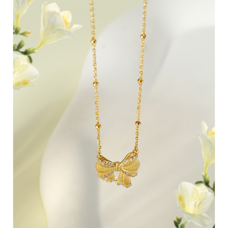 Small design matte necklace with zircon with bow