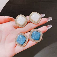 Серьги-гвоздики из серебра 925 Шестиугольник с кристаллическим нимбом - деликатная штифт-подкладка, синий или белый центр