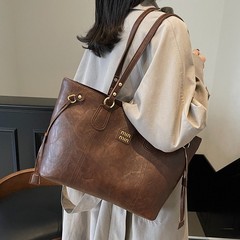 ショルダーバッグ女性高級感トートバッグ大容量女性バッグ通勤百合2025新型大衆流行ハンドバッグ