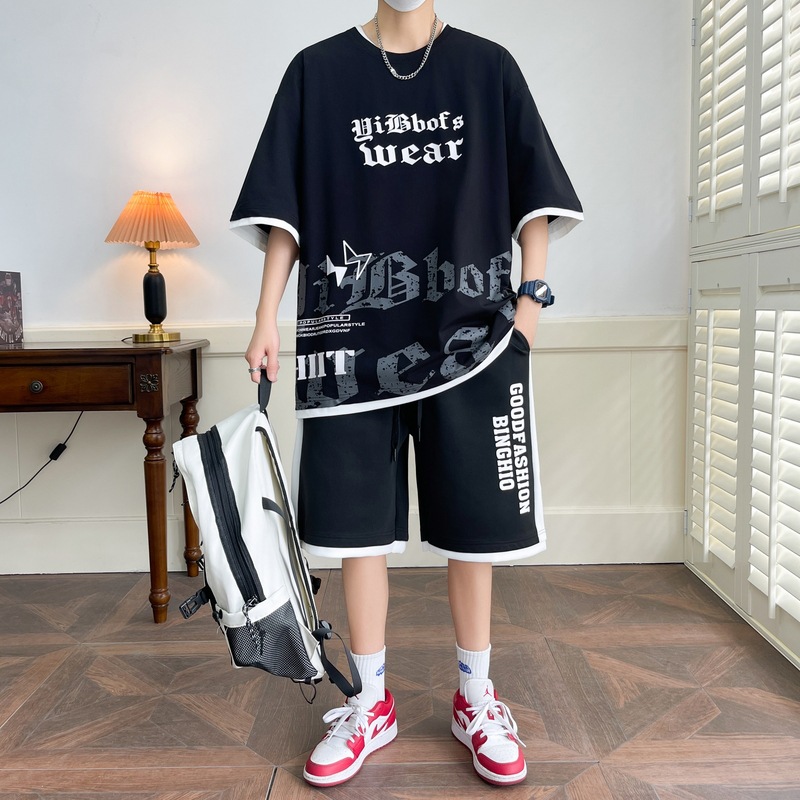 Hombre de verano suit suelto 2025 nuevos pantalones cortos de manga corta moda juvenil casual guapo camiseta deportiva dos piezas set