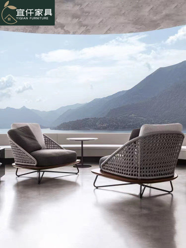 Nordic outdoor sofa and lounge balcony rattan chair and coffee table set of three, designer homestay courtyard hotel villa