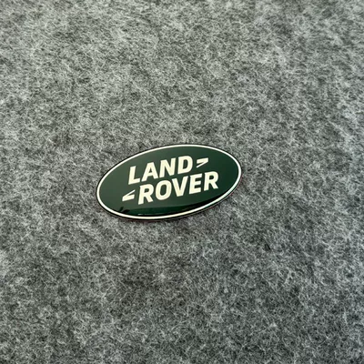 Car logo, Land Rover grille emblems, including the