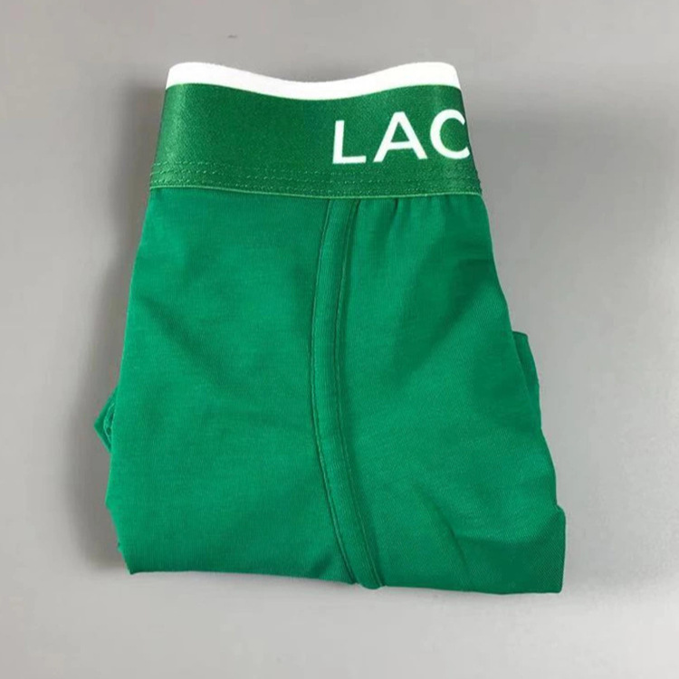 Europa y los Estados Unidos transfronterizos peces de moda para hombres, pantalones de algodón transpirables, pantalones cortos de ángulo plano de moda cómodos y casuales, productos en stock
