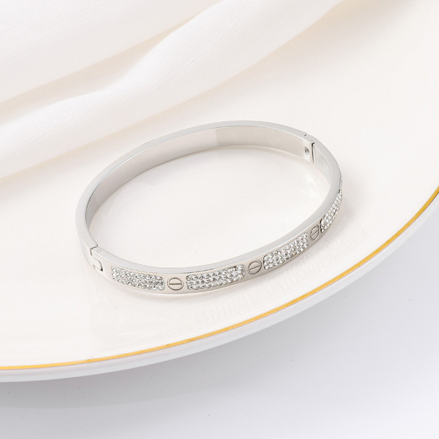 Pulsera de titanio y acero para mujer, diseño moderno y sencillo, pulsera de lujo que no se desvanece, venta al por mayor en stock.