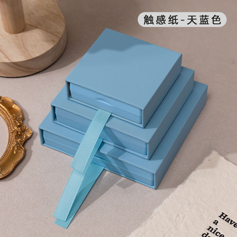 Caja de cajón de papel táctil azul cielo (incluida la Caja de suspensión); 7*7*2cm