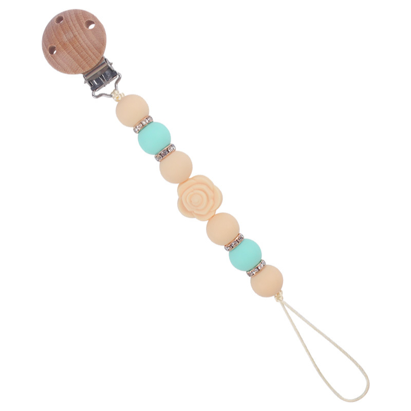 Nuevo bebé de dibujos animados de doble cara Rosa mordedor creativo DIY flash cuentas de ladrillo silicona mordedura pezón cadena anti-caída