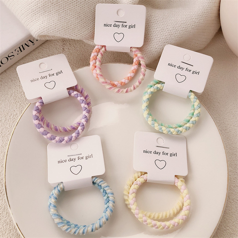 A principios de la primavera nueva cuerda de cabeza de color caramelo anillo de cabello coreano de niña de alta elasticidad universal cola de caballo cuerda de cabello adornamiento para el cabello