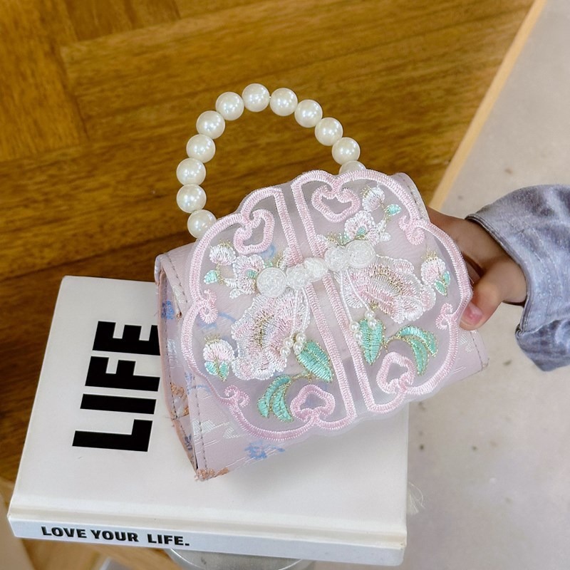 Nuevo estilo chino retro bolso de perla de viento 2025 bolso de cambio sobre rojo bolso de princesa de niñas Hanfu