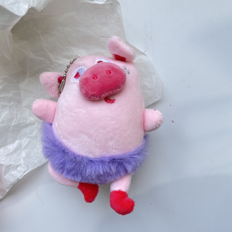 バレエ豚のペンダントピンクの子豚の人形人形人形が醜いぬいぐるみのかばんを飾っています。|undefined
