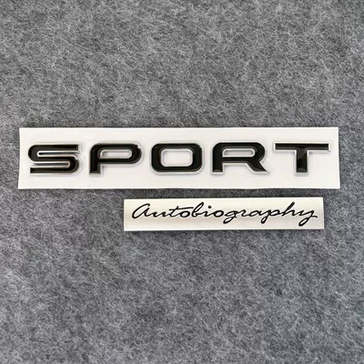 Car logo, emblem, including the lettering, the "Queen's Signature" emblem