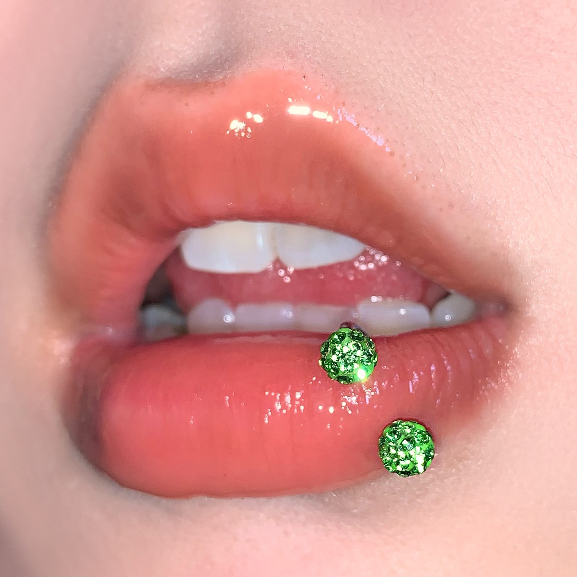 Silver pointed spike labret stud material detail