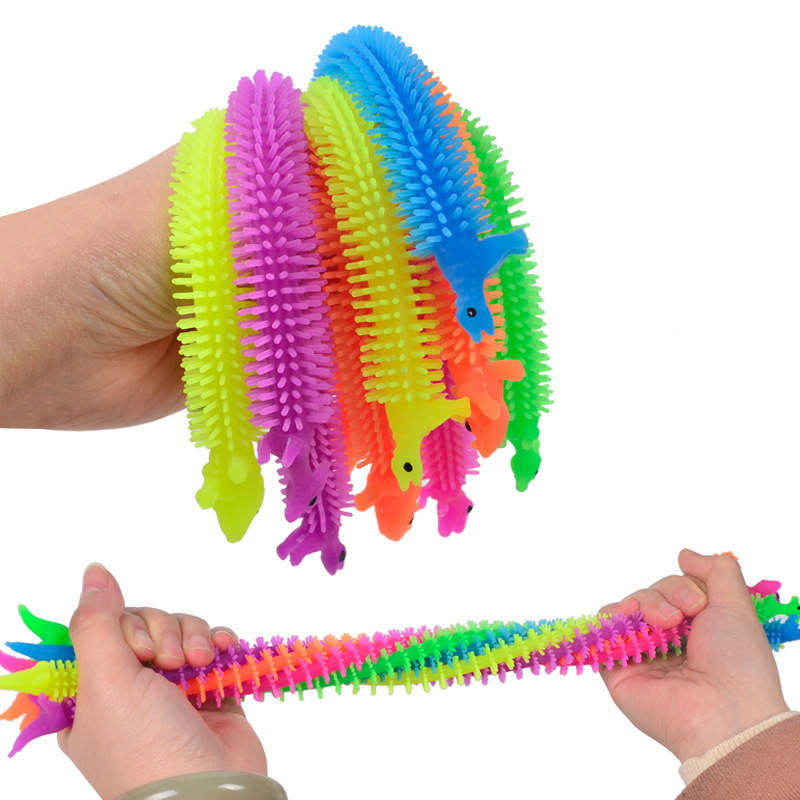 Amazon Venta caliente creativo nuevo dinosaurio Lala descompresión ventilación cuerda dibujos animados alpaca pulsera pull fideos