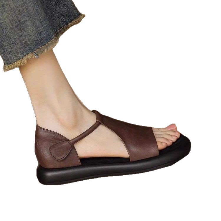 Nicho retrógrado sandalias de dedos desnudos para mujeres de verano 2026 nuevo hueco casual cómodo zapatos romanos planos
