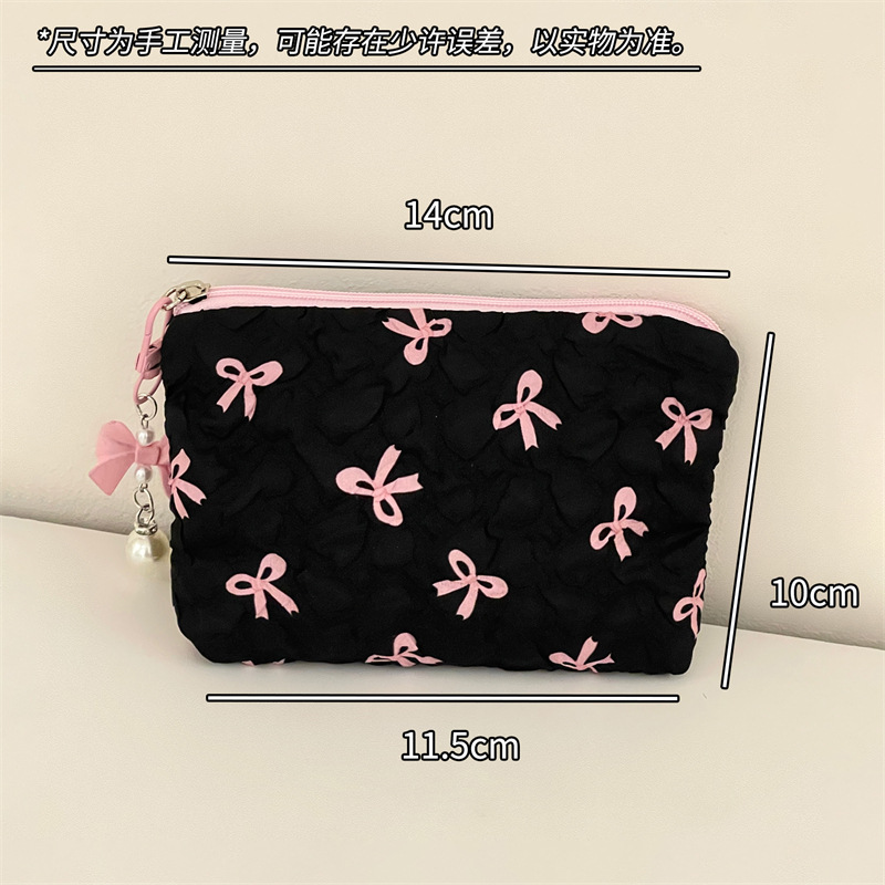 Nueva bolsa de almacenamiento de dormitorio de estudiantes de nicho de arco de maquillaje portátil de gran capacidad para salir a lavar