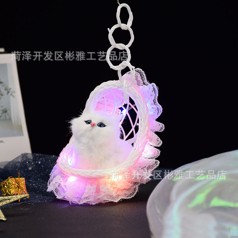 Cestas luminosas con lámparas y llamadas gatitos, simulación de gatos, juguetes luminosos para niños, estandos, puntos de venta.