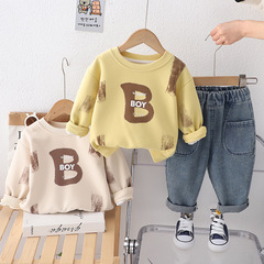 春の男の子の子供服の洋風のカジュアルなB字の丸首の衛衣の男の子の春秋の金の2025ジーパンの格好いい2セット