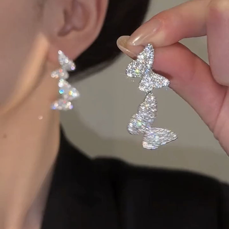 Pendientes de perlas de flor de circón de aguja de plata, pendientes de lujo de alta gama de lujo ligero exquisito, pendientes de todo fósforo blanco de moda de nicho al por mayor
