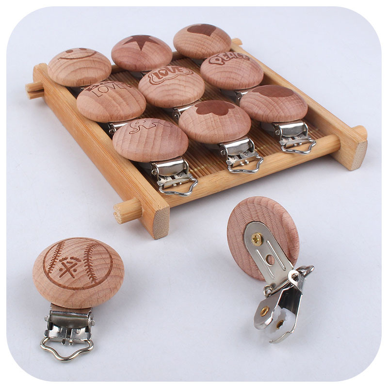 Suministros para bebés clip de chupete de haya clip de chupete de madera animal de dibujos animados amor Paz calmante clip de chupete de haya