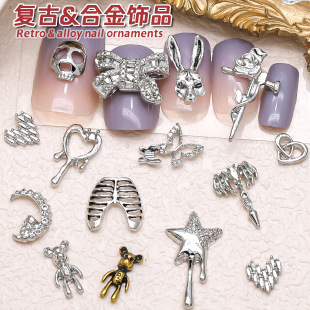 2024 New Nail Art Accessories Wholesale Metal Hot Girl Skeleton Bear Love Butterfly Bone Cross Nail Art Accessories