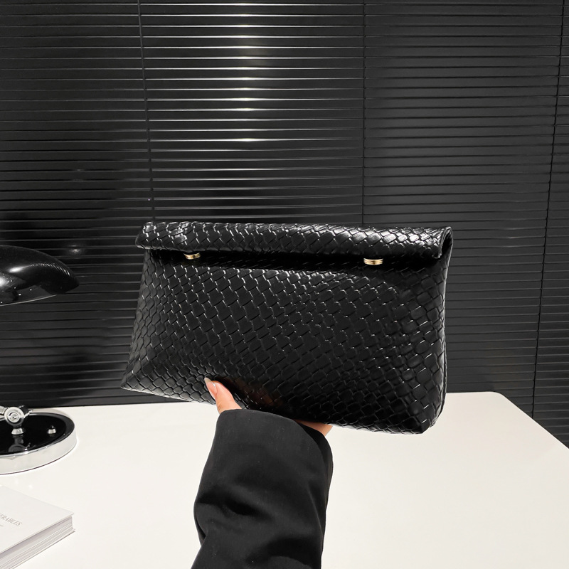 2025 verano nuevo estilo personalidad bolso de mano de moda tendencia bolso de mano de estilo occidental simple temperamento salvaje textura de alta calidad