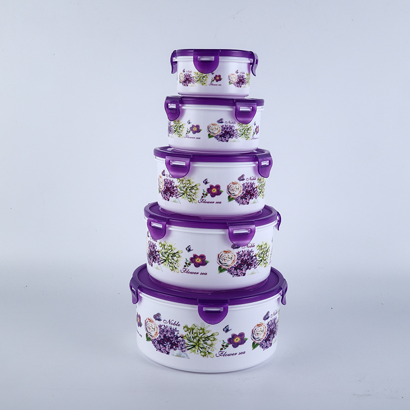 Caja redonda hermética para almacenamiento de alimentos, ideal para refrigerador, camping o uso doméstico.