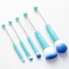 Blue brush handle + blue bristles