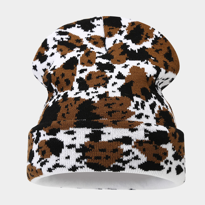 Moda europea y americana Nueva leopardo Jacquard sombrero de punto engrosado cálido hombres y mujeres otoño e invierno Gran circunferencia de la cabeza protección del oído sombrero de lana