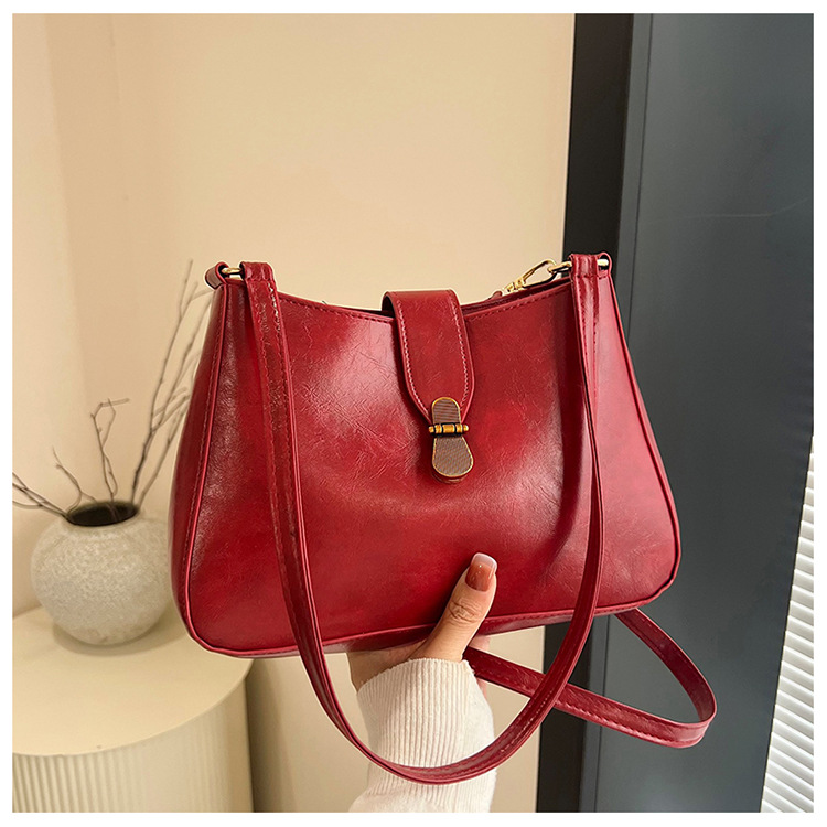 Nichezhong retro simple bolso de brazo bolso de mujer 2025 primavera nueva moda bolso pequeño de viaje de moda mochila de hombro