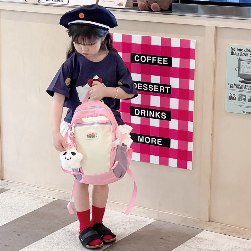 2026 nueva mochila infantil caricatura encantadora con colgantes mochila de niños y niñas de gran capacidad de la escuela primaria mochila de la marea