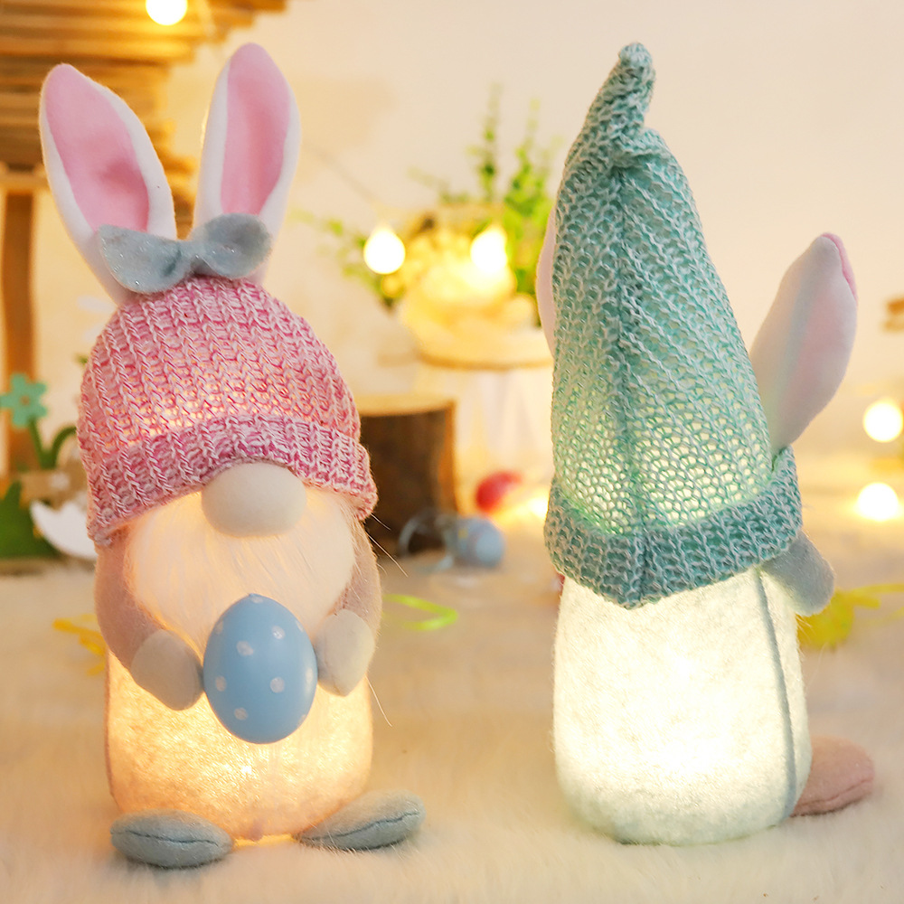Nuevas decoraciones de Pascua que emiten luz sin rostro muñeca vieja Orejas de conejo sosteniendo colorido huevo enano muñeca adornos