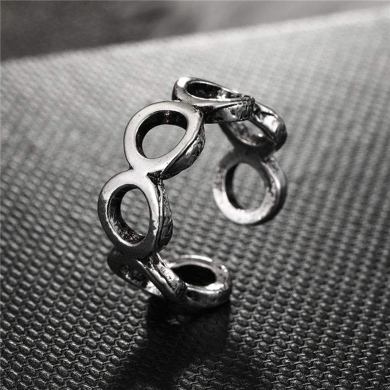 Fashion Geometric Bow Smooth Hollow Metal Ring display picture 5