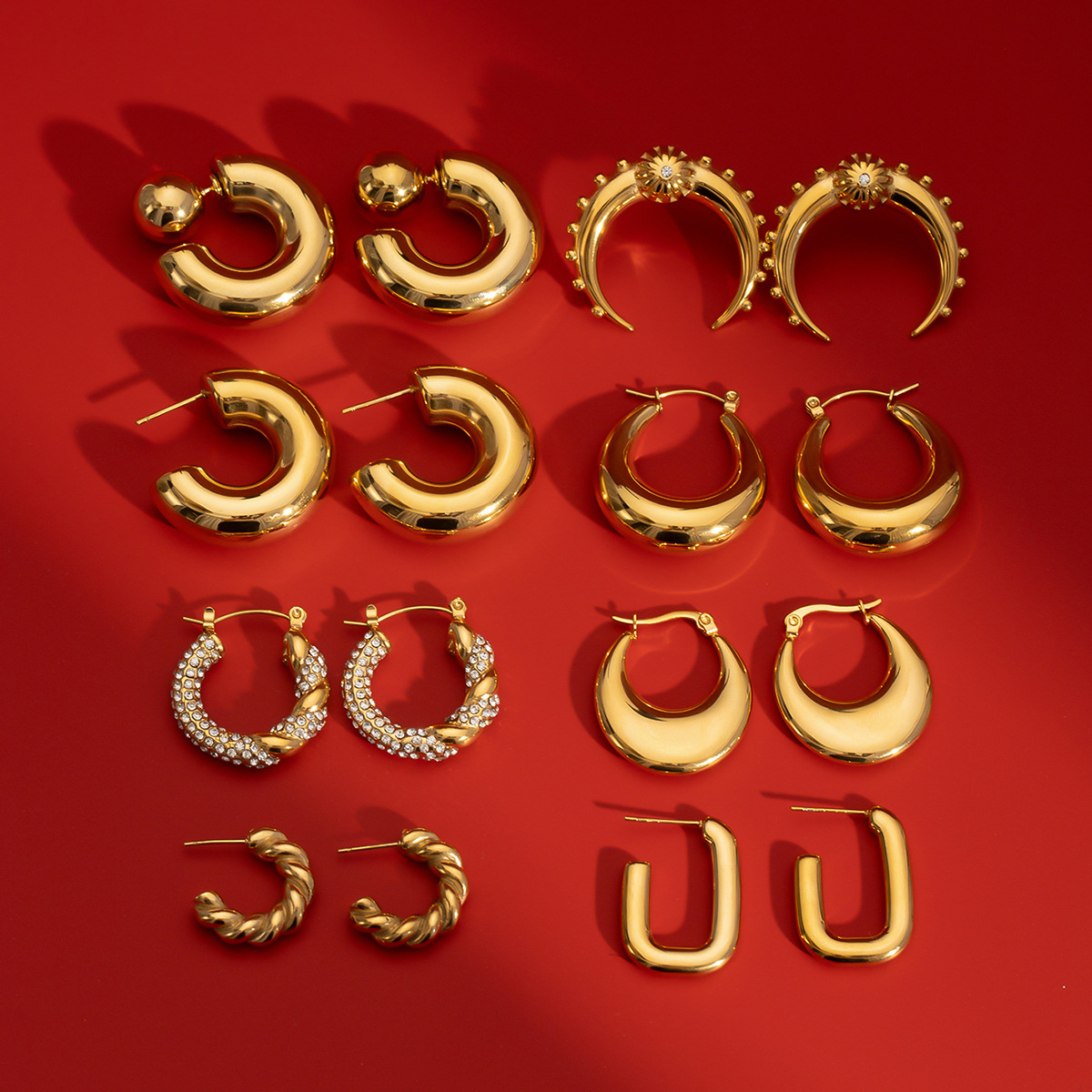 Jieding Pendientes de doble c de acero inoxidable europeo y americano Pendientes de circón de alta calidad