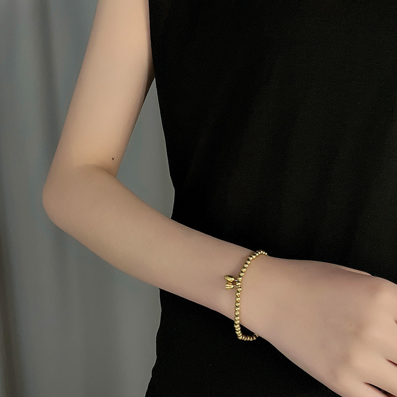 Dos pulsera Shihuan Cadena de estilo étnico de las mujeres Lotus joyería de titanio de acero chapado en oro joyería de la muchacha pulsera de temperamento simple