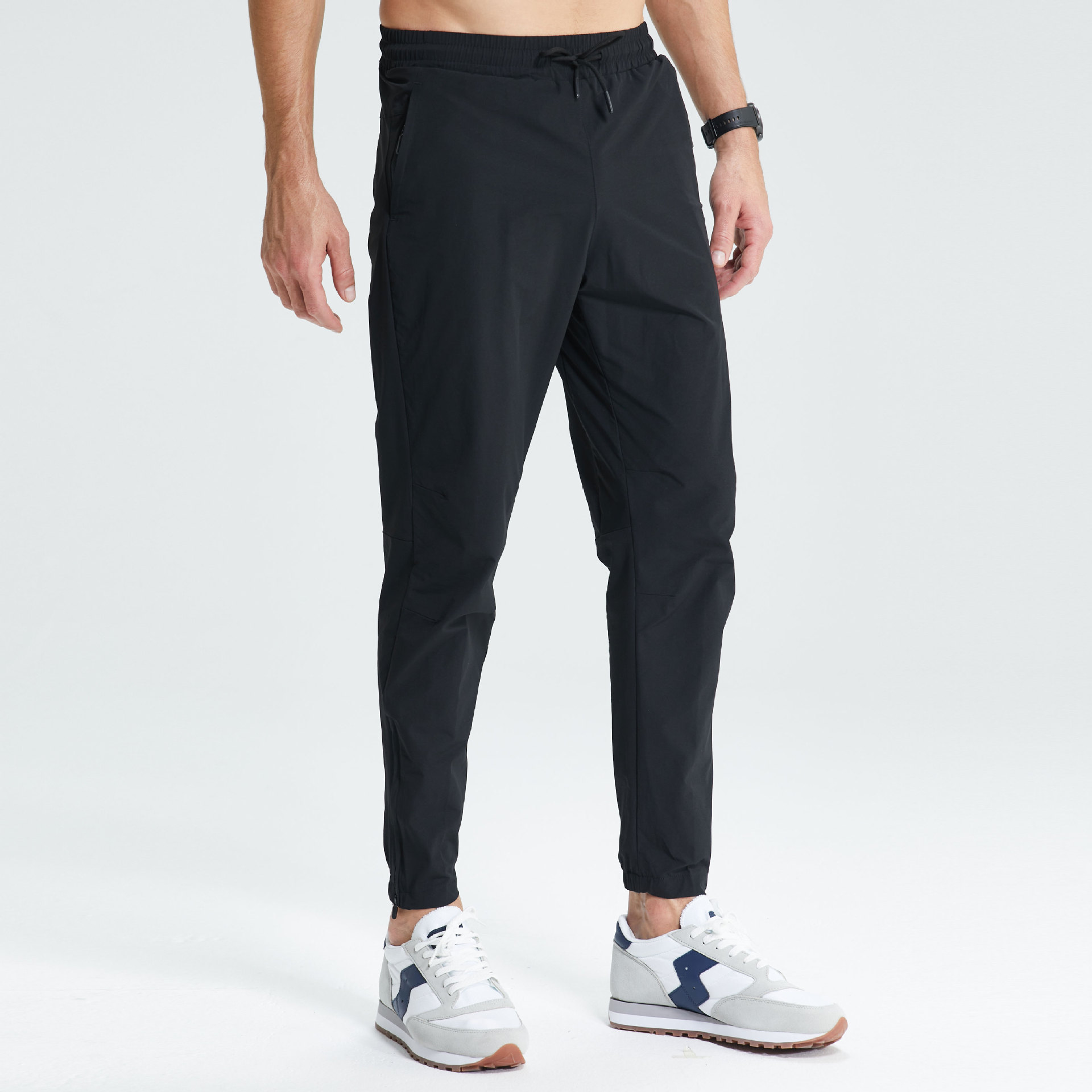 Pantalones de secado rápido impermeables para exteriores Pantalones deportivos de fitness transpirables y resistentes al desgaste de escalada de pies con cremallera elástica delgada tejida para hombres