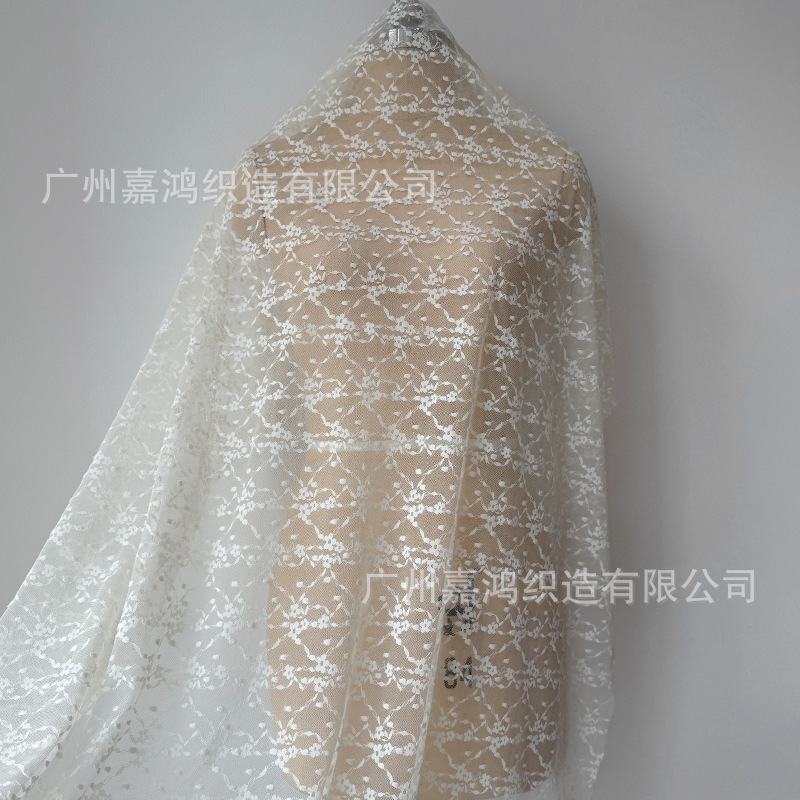 Tejido de encaje elástico jacquard tridimensional para hacer falda, vestido de perspectiva, falda elástica, albaricoque blanco y negro en stock
