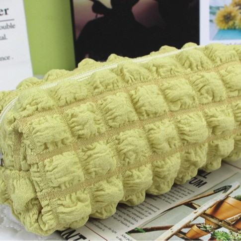 INS Cream puff bolso de la pluma del estudiante burbuja nicho no golpeando gran capacidad fufu suave bolsa de cosméticos de almacenamiento