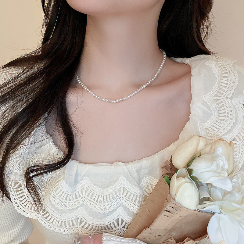 フランスのレトロなツバキの花の真珠のネックレスの東大門の蝶の花のペンダントの鎖の鎖の軽い贅沢な高級感の首の鎖|undefined