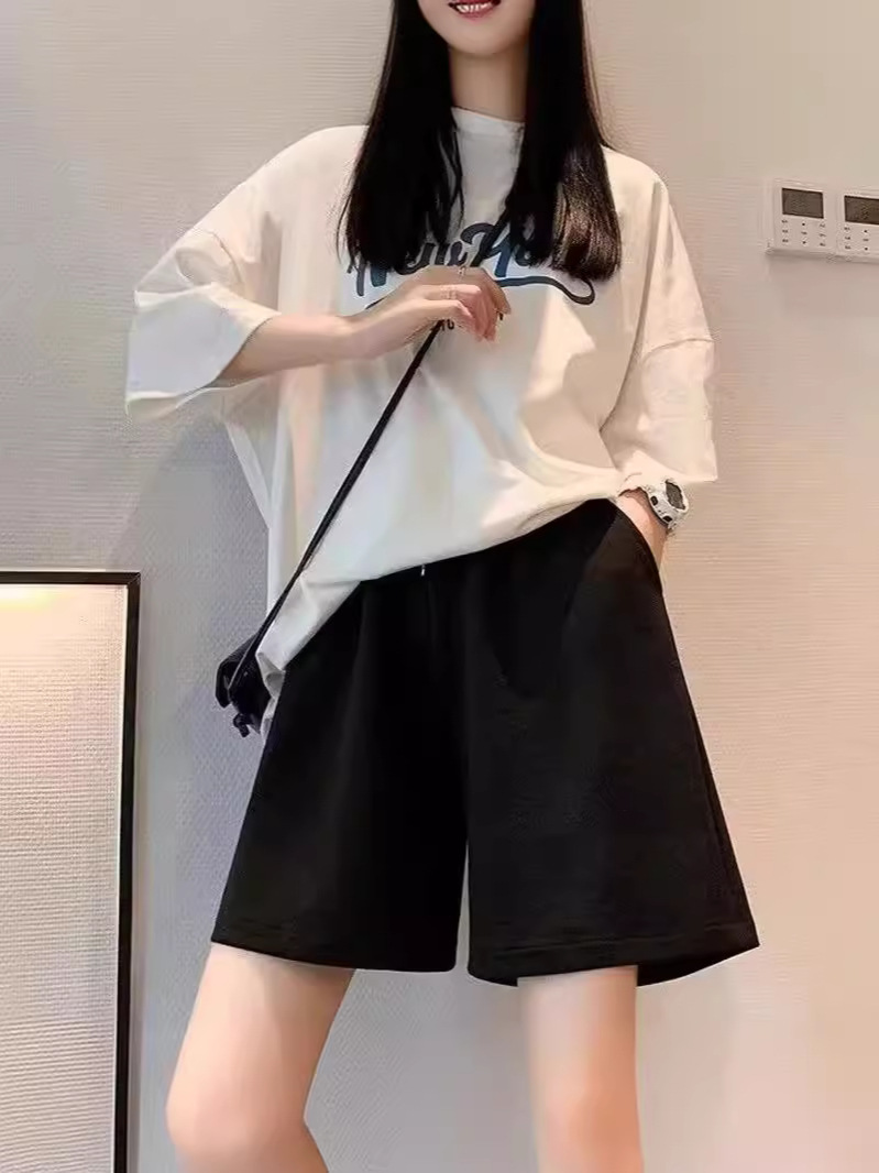 Compre uno gratis 15 pantalones cortos de color sólido deportivos para hombres y mujeres super delgados en forma de A versátil pareja de pantalones de verano