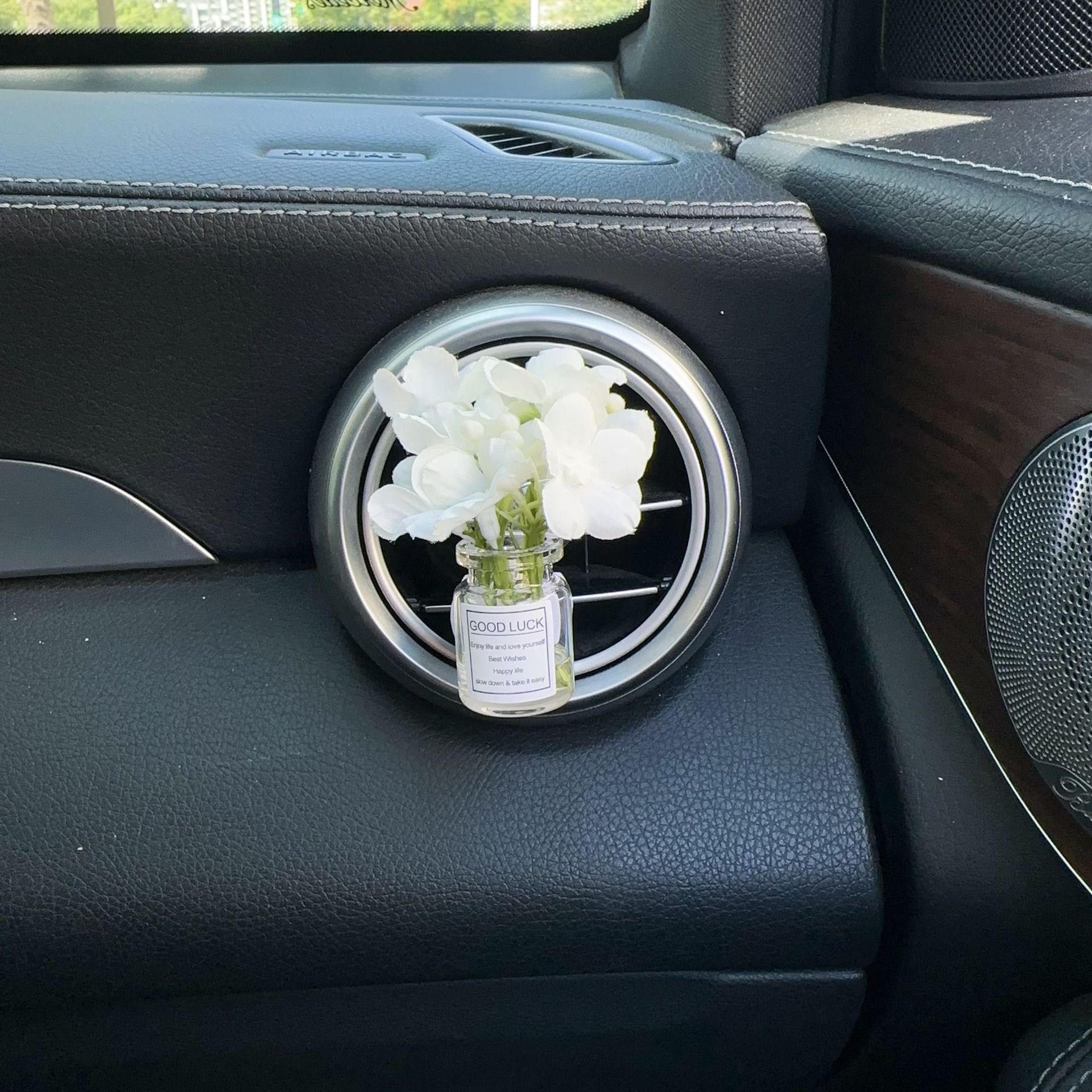 Decoración creativa de salida de aire del automóvil con flores de estrellas pequeñas frescas aire acondicionado botella de perfume de perfumes