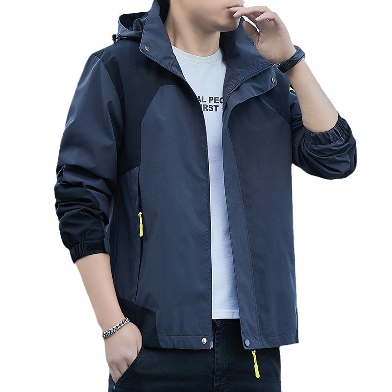 Nueva primavera y otoño chaqueta al aire libre pareja chaqueta a prueba de viento impermeable chaqueta con capucha Top montañismo ropa hombres al por mayor