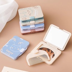 創意的に櫛の小さい鏡を持っています。屋外の携帯鏡をセットして、一体になって化粧鏡を畳みます。